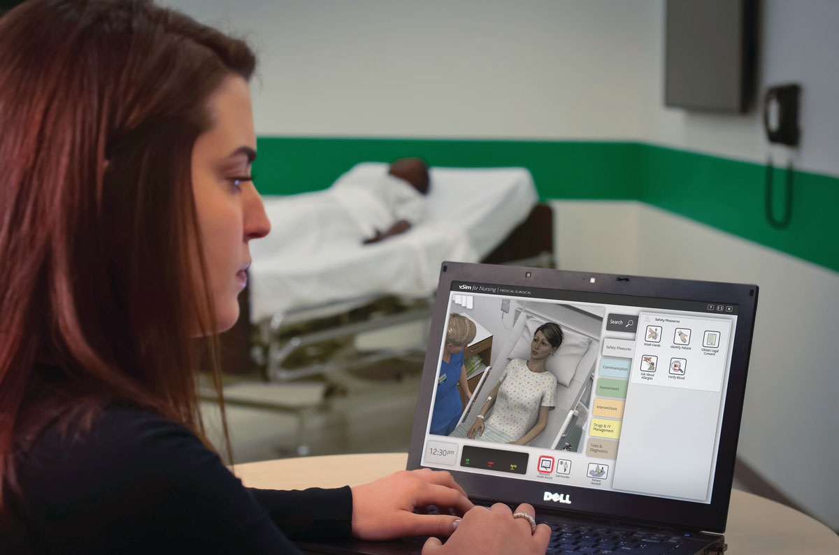 vSim_nursinganne.jpg Woman using vSim for Nursing showing a 3D patient