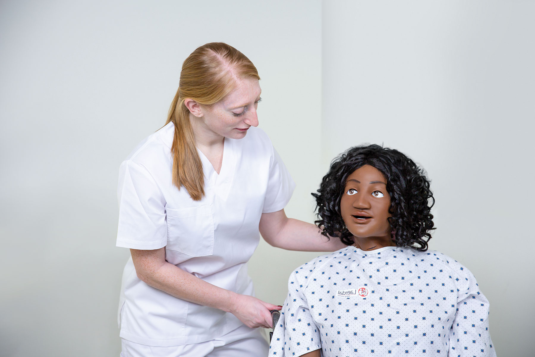 nursing_anne_sim_dark_wheelchair_nurse.jpg.